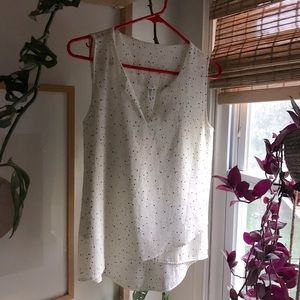 White speckled sleeveless blouse